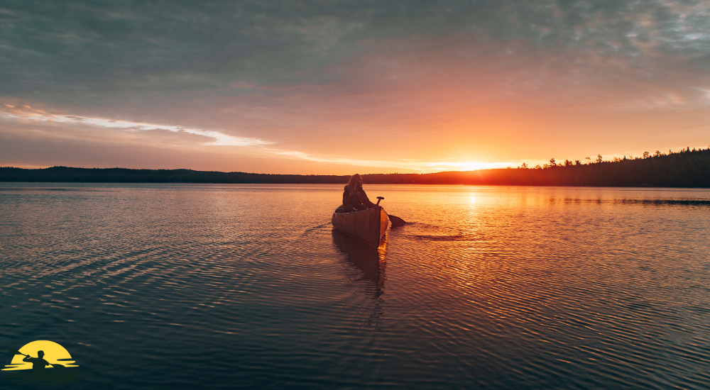 kayak on water at sunset time 