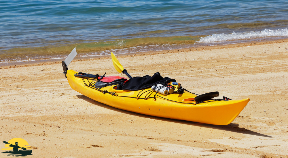 a kayak besides a beach