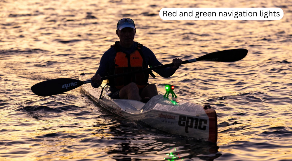 A man is kayaking in the ocean