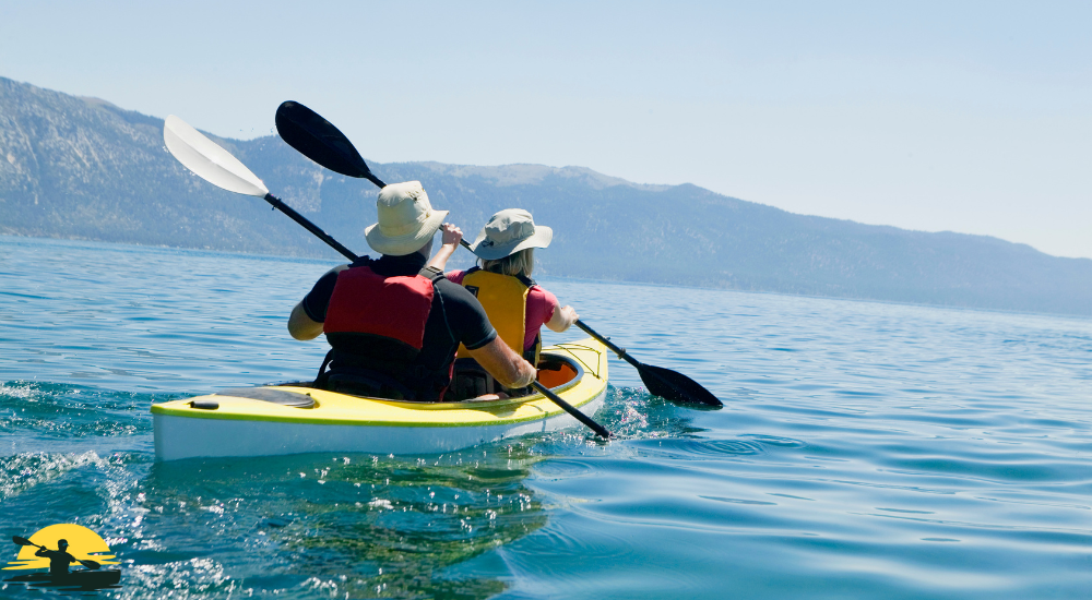 A man and lady kayaking together