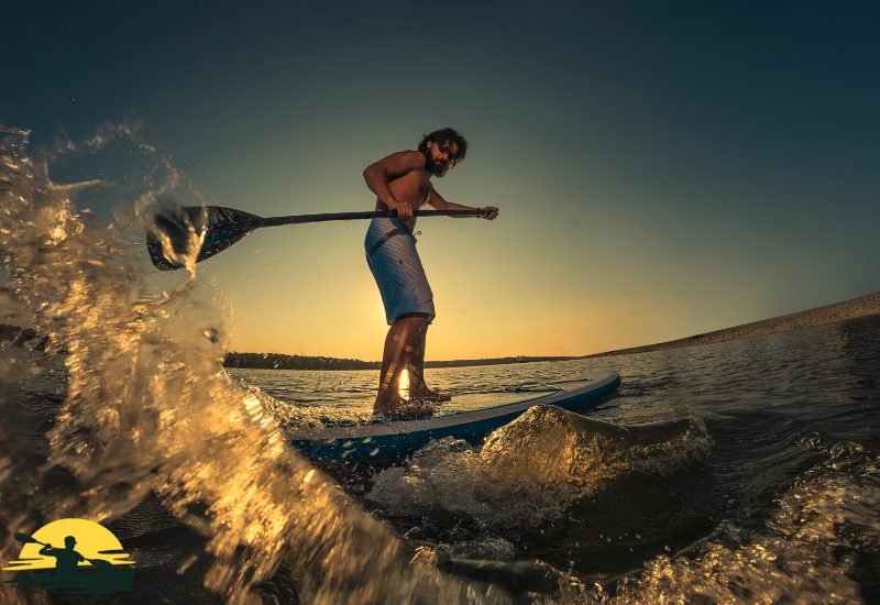 Holding a Paddle Board Paddle