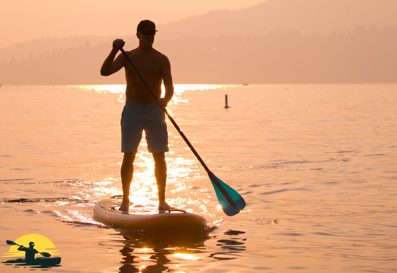 Holding a Paddle Board Paddle