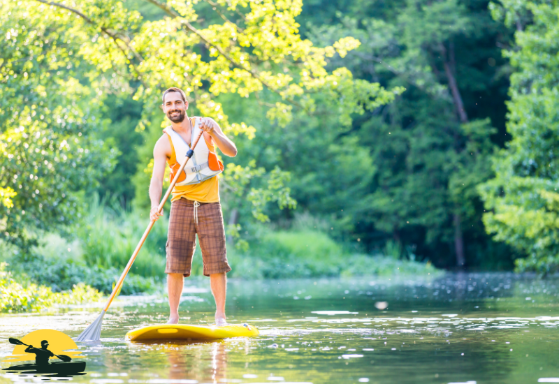 Holding a Paddle Board Paddle