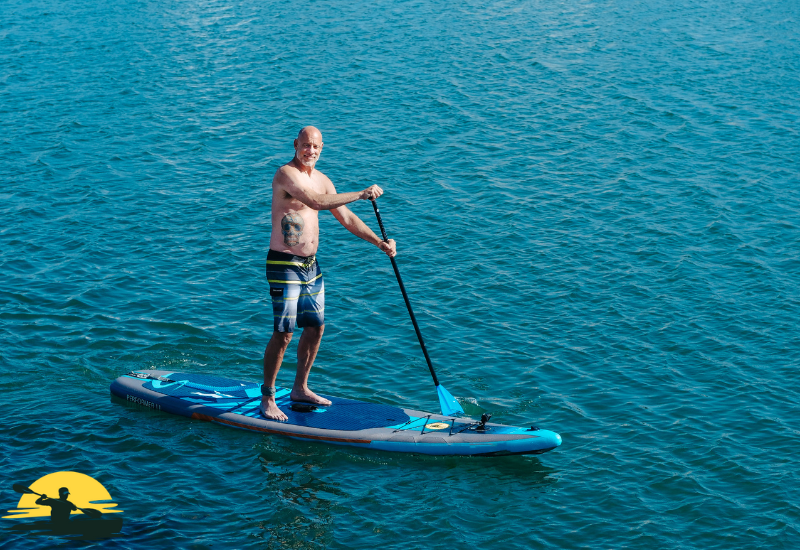 Holding a Paddle Board Paddle