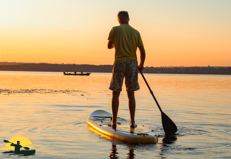 Holding a Paddle Board Paddle