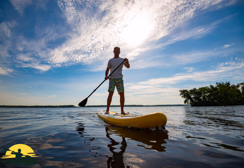 Holding a Paddle Board Paddle