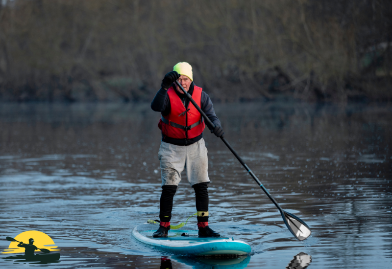 Holding a Paddle Board Paddle