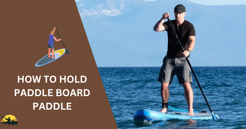 How to hold paddle board paddle