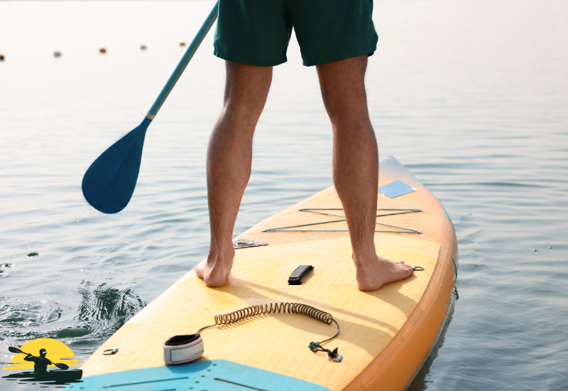 A men is Paddling a inflatable board